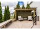 Inviting back deck features outdoor seating and a pergola, perfect for relaxation at 9559 Summer Hollow Dr, Fishers, IN 46037