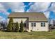 The home features a spacious backyard with well maintained lawn, treelined pergola and an expansive lawn at 9559 Summer Hollow Dr, Fishers, IN 46037