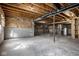 Unfinished basement offering a blank canvas with visible beams and concrete floors at 9559 Summer Hollow Dr, Fishers, IN 46037