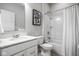 Bathroom featuring a shower-tub combo, single vanity, and neutral color scheme for a clean and functional space at 9559 Summer Hollow Dr, Fishers, IN 46037