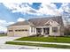 Attractive single-Gathering home with three-car garage and well-kept lawn showcasing curb appeal at 9559 Summer Hollow Dr, Fishers, IN 46037