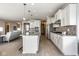 Spacious kitchen with a large island, modern appliances, and seamless flow into the adjacent living area at 9559 Summer Hollow Dr, Fishers, IN 46037