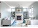 Cozy living room features a fireplace, built-in shelves, comfortable seating, and natural light for a relaxing atmosphere at 9559 Summer Hollow Dr, Fishers, IN 46037
