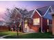 Charming brick home with flowering tree in full bloom at 1014 Shannon Ave, Indianapolis, IN 46201