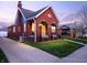Charming brick home with arched porch and inviting curb appeal at 1014 Shannon Ave, Indianapolis, IN 46201