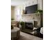 A stone fireplace adds a warm and inviting focal point to the living room at 1014 Shannon Ave, Indianapolis, IN 46201