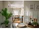 Bright and airy kitchen with modern appliances, white cabinetry, and a view into the dining area at 1014 Shannon Ave, Indianapolis, IN 46201