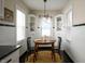 Kitchen area highlighting dining space with table, chairs, and ample natural light at 1014 Shannon Ave, Indianapolis, IN 46201