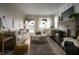 Cozy living room featuring a stone fireplace, plush seating, and an area rug at 1014 Shannon Ave, Indianapolis, IN 46201