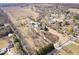 Expansive aerial view showcasing the property's location amidst fields and a charming neighborhood at 10333 E 211Th St, Noblesville, IN 46062