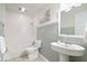 Cozy bathroom featuring a shower and tub, with stylish gray and white decor and modern fixtures at 10333 E 211Th St, Noblesville, IN 46062