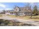 Charming white home featuring a spacious front porch and inviting entrance at 10333 E 211Th St, Noblesville, IN 46062