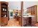 Warm and inviting kitchen featuring wood cabinetry and island at 10333 E 211Th St, Noblesville, IN 46062