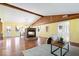 Bright open-concept living space featuring a fireplace and hardwood floors at 10333 E 211Th St, Noblesville, IN 46062