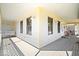 Spacious wraparound porch with white railings, swing and outdoor seating perfect for relaxing at 10333 E 211Th St, Noblesville, IN 46062