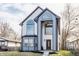 Stunning two-story home with modern design, large windows and manicured landscaping at 1533 Harlan St, Indianapolis, IN 46203