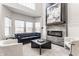 Stylish living room featuring a modern fireplace, comfortable seating, and elegant decor at 1533 Harlan St, Indianapolis, IN 46203