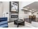 Stylish living room featuring a modern fireplace, comfortable seating, and elegant decor at 1533 Harlan St, Indianapolis, IN 46203