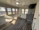 Basement with new vinyl flooring, furnace, and electrical box, ready for finishing at 1632 W 17Th St, Anderson, IN 46016