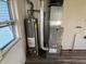 Basement featuring a water heater and furnace for efficient climate control and hot water at 1632 W 17Th St, Anderson, IN 46016