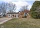 Charming brick ranch-style home with a covered porch and inviting curb appeal at 1840 Hibiscus Dr, Indianapolis, IN 46219
