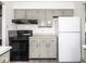 Well-equipped kitchen with sleek appliances and classic cabinetry at 1840 Hibiscus Dr, Indianapolis, IN 46219