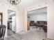 A spacious living room showcasing a seamless transition to the kitchen at 1840 Hibiscus Dr, Indianapolis, IN 46219