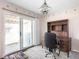 Well-lit office with a large sliding glass door and a cozy interior design at 1840 Hibiscus Dr, Indianapolis, IN 46219