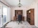 Cozy office with desk, shelving and outside access at 1840 Hibiscus Dr, Indianapolis, IN 46219