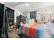 A bedroom with bed, ceiling fan, and wood-look flooring at 2123 N F St, Elwood, IN 46036