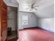 Attic bedroom with wood floors, closet and natural light from window at 2123 N F St, Elwood, IN 46036