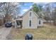 Exterior view of the home featuring simple design and classic siding at 2123 N F St, Elwood, IN 46036