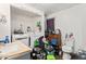 A laundry room with washer, dryer, sink, and additional toilet at 2123 N F St, Elwood, IN 46036