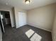 Cozy, carpeted bedroom providing ample natural light and convenient closet space at 2402 Middle View Dr, Columbus, IN 47201