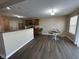 A dining area features a wooden table with wicker chairs near a window at 2402 Middle View Dr, Columbus, IN 47201