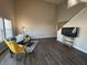 Open concept living room featuring wood floors, natural light, and modern furniture at 2402 Middle View Dr, Columbus, IN 47201