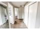Hallway with wood flooring and access to rooms including the bathroom at 3008 Nichol Ave, Anderson, IN 46011