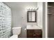 Bathroom featuring a mirror, shower with curtain and toilet at 3225 S Rybolt Ave, Indianapolis, IN 46221