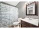 Bathroom featuring a mirror, shower with curtain and toilet at 3225 S Rybolt Ave, Indianapolis, IN 46221