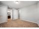 Neutral bedroom with carpet flooring, closet and ensuite bathroom access at 3225 S Rybolt Ave, Indianapolis, IN 46221