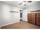 Bedroom featuring neutral carpet, a ceiling fan, and a spacious closet at 3225 S Rybolt Ave, Indianapolis, IN 46221