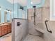 Modern bathroom with a glass walk-in shower, rainfall showerhead, and double vanity at 3559 Towne Dr, Carmel, IN 46032