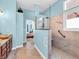 Bathroom featuring a modern glass shower, double vanity, and calming blue walls at 3559 Towne Dr, Carmel, IN 46032