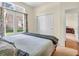 Bright bedroom with large windows, neutral decor, and closet space, offering a serene retreat at 3559 Towne Dr, Carmel, IN 46032