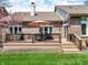 Relaxing deck area with comfortable seating and shade, perfect for outdoor dining and entertaining at 3559 Towne Dr, Carmel, IN 46032