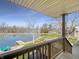 Enjoy stunning waterfront views from the back porch of this lovely home at 3736 W South Wood Lake Dr, Columbus, IN 47201