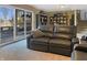 Cozy basement area with sliding door and stairs at 3736 W South Wood Lake Dr, Columbus, IN 47201