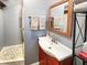 Cozy bathroom featuring a unique vanity and tiled shower, perfect for relaxation at 3736 W South Wood Lake Dr, Columbus, IN 47201