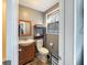 Cozy bathroom with a sink, toilet, and decorative window at 3736 W South Wood Lake Dr, Columbus, IN 47201