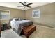 Comfortable bedroom with a ceiling fan and two windows at 3736 W South Wood Lake Dr, Columbus, IN 47201